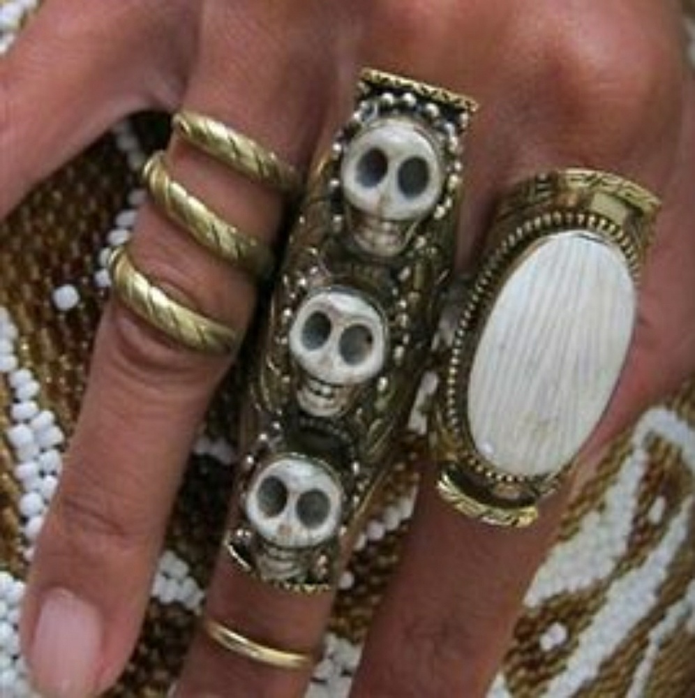 Natalie B antiqued gold tone 3 skulls knuckle ring